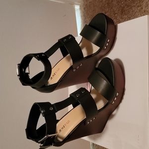 Just Fab worn once.  Black size 7 1/2